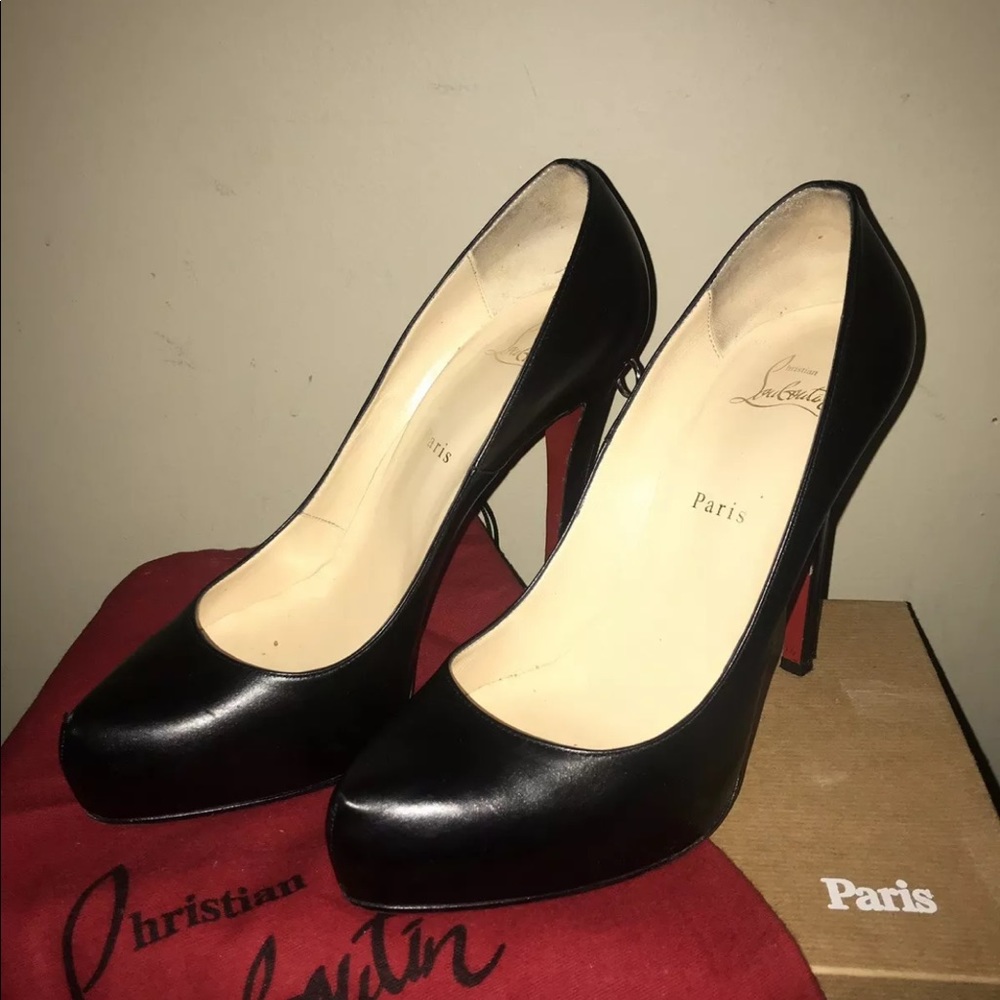 SOLD Christian Louboutin Rolando Zip Black Pump